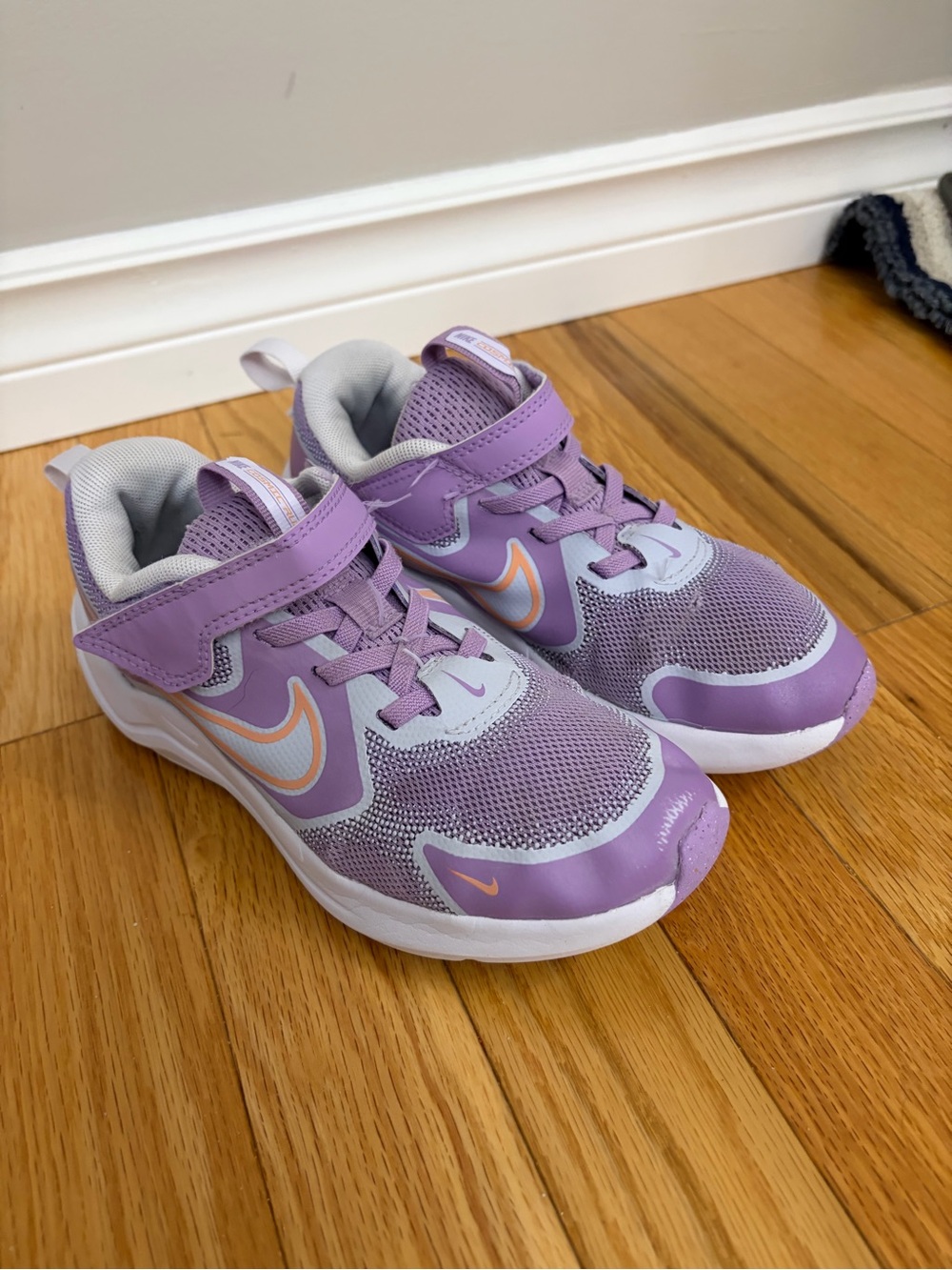 Nike Kids Lavender and White Athletic Sneakers with Orange Swoosh